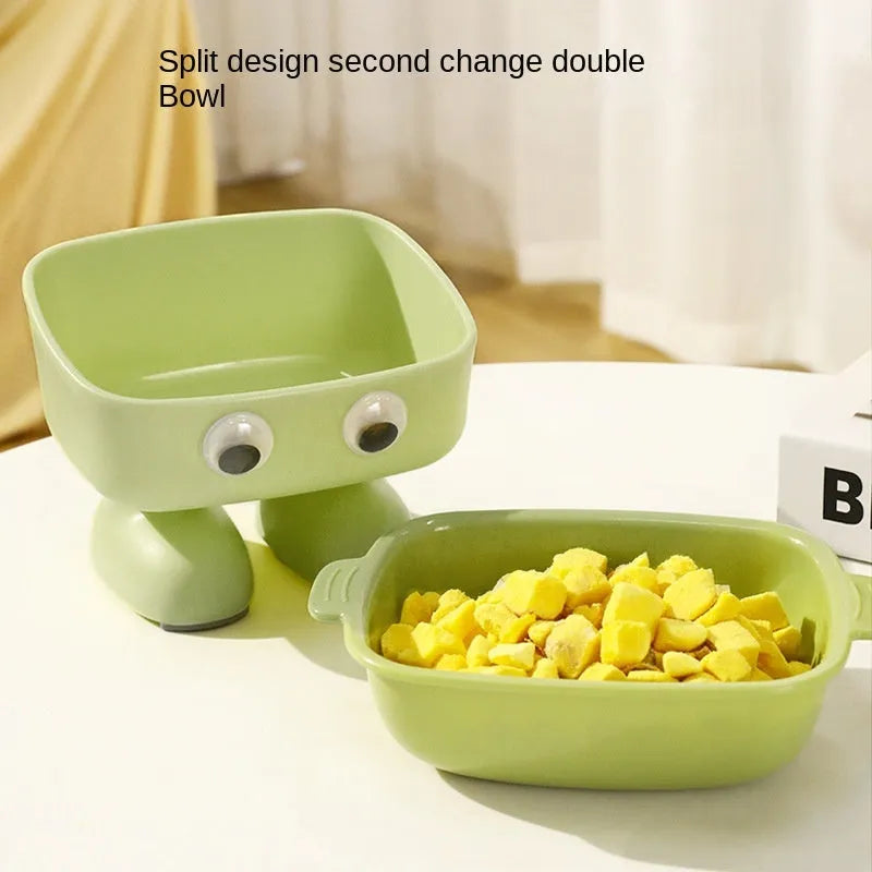 Robot-shaped elevated cat bowl with 15 degree tilt in green colour with detachable inner bowl