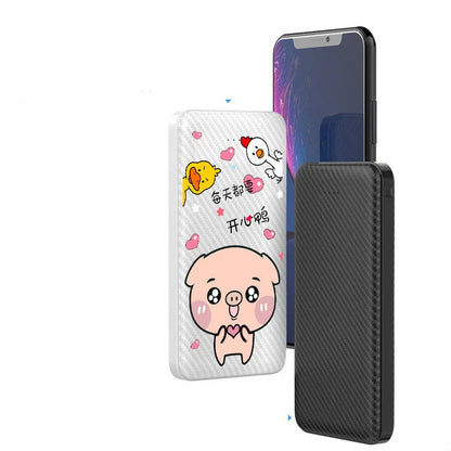 White portable power bank with 20000mAh capacity and multiple USB output ports on a table.