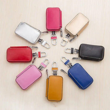 White genuine leather square car key case with plain weave pattern, shown with key bag