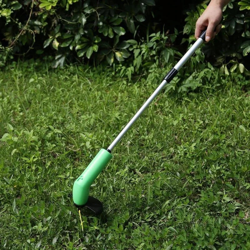 Cordless lawn trimmer with extension pole and debris shield for garden maintenance
