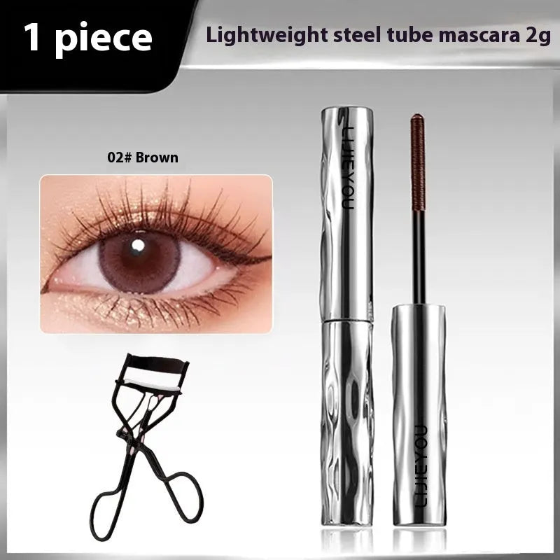 Waterproof steel tube mascara in black and brown shades with optional eyelash curler.
