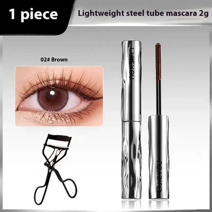 Waterproof steel tube mascara in black and brown shades with optional eyelash curler.