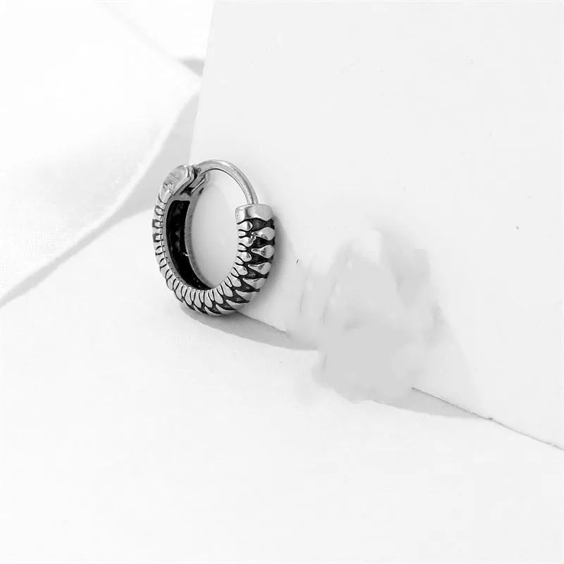 Silver retro twist earrings with geometric stripe design and round elements on stainless steel