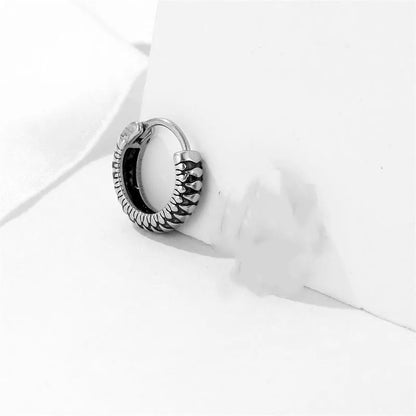 Silver retro twist earrings with geometric stripe design and round elements on stainless steel