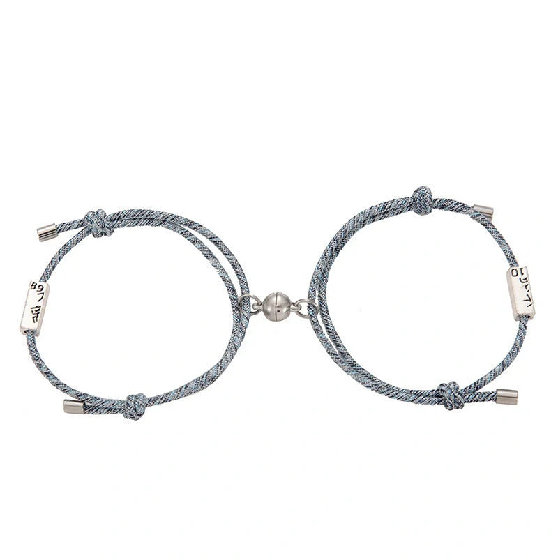 Magnetic couple's bracelet with geometric design and meaningful charms inspired by ancient Chinese tradition