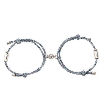 Magnetic couple's bracelet with geometric design and meaningful charms inspired by ancient Chinese tradition