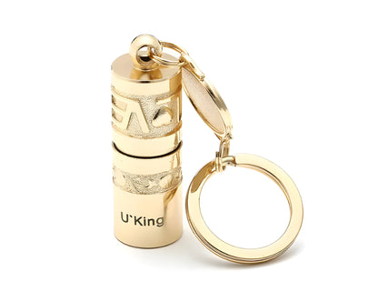 Gold zinc alloy keychain torch with LED light, shown attached to a keyring.