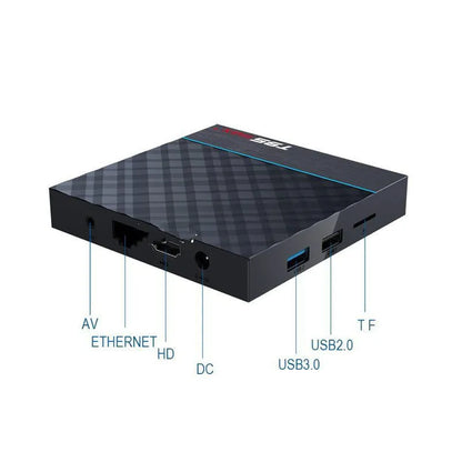 Black T95 Max Plus Android TV Box set-top unit with remote control on a wooden surface.