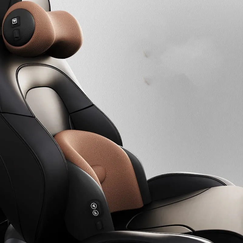 Black car massage cushion with headrest and lumbar support on a car seat, showing wired controller.