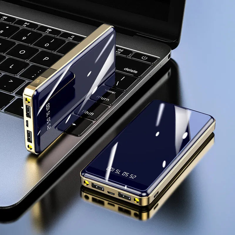 Square-shaped 20000mAh power bank with digital display screen showing battery percentage.