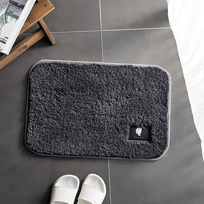 Rectangular anti-slip bathroom mat with polyester fibre construction in multiple colour options