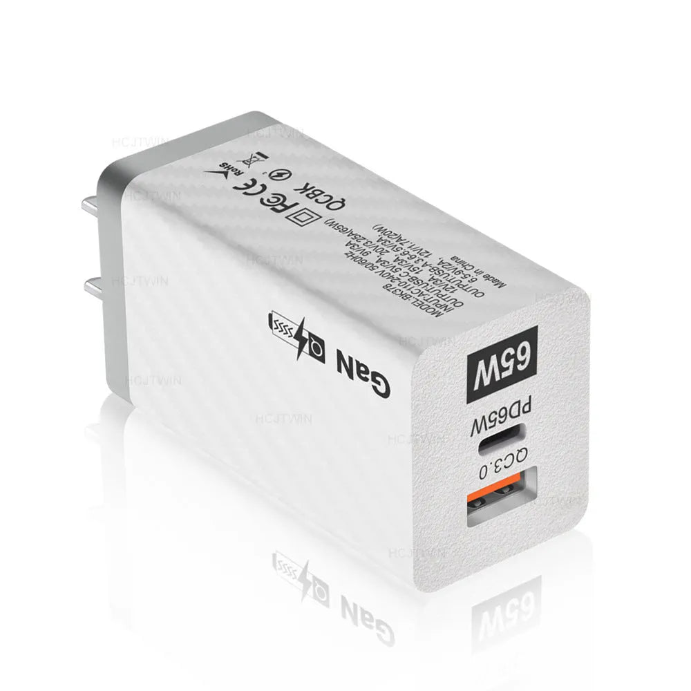 Compact white 65W Gallium Nitride USB-PD laptop charger with plug