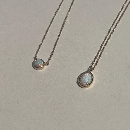 S925 sterling silver oval pendant necklace with jelly opal style, available in gold or white gold plating.