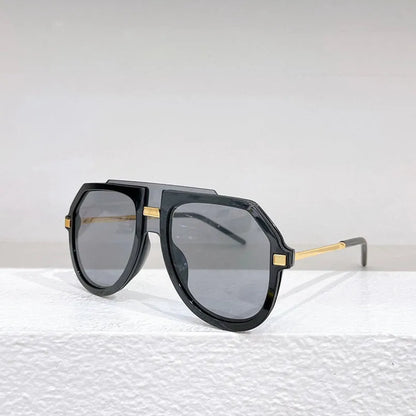 Women's fashion sunglasses with black leopard print pattern on large elliptical frame