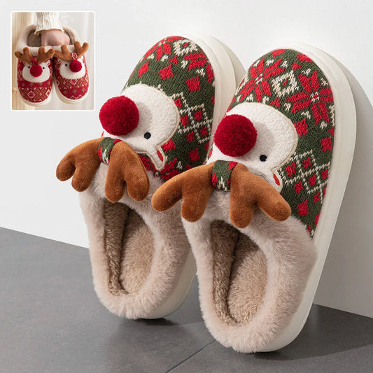 Cozy elk-themed Christmas slippers in green and red colors, featuring a plush, fuzzy design and non-slip sole for comfortable indoor wear