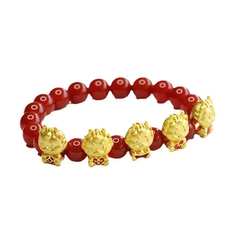 Red agate bracelet with carved five blessing dragon motifs on 8mm beads.