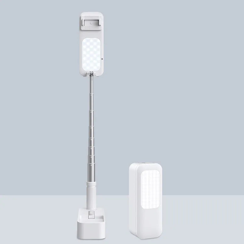 Pink floor-standing fill light with telescopic aluminium alloy stand and wireless remote for mobile phone live streaming.