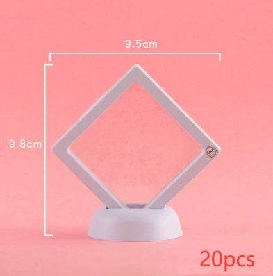3D floating jewelry coin display stand in white and black, showcasing collectibles in mid-air