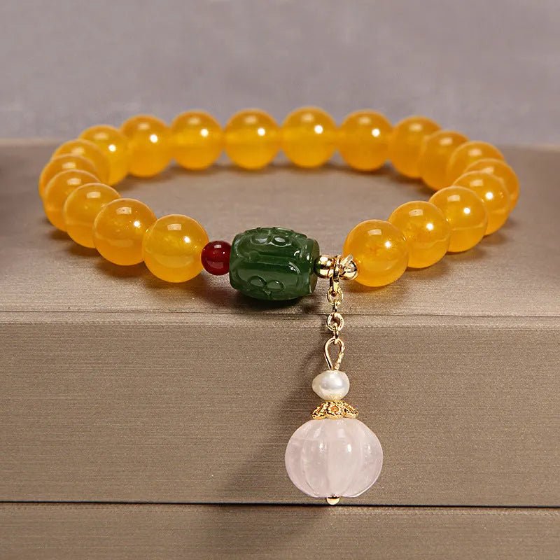 Yellow agate crystal bracelet for women with gold silk threading in khaki colour