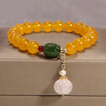 Yellow agate crystal bracelet for women with gold silk threading in khaki colour