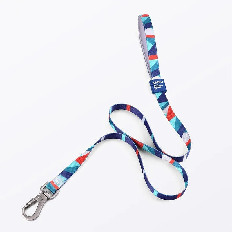 Blue polyester dog haulage vest with integrated leash set on a model, showing the chest strap and traction rope.