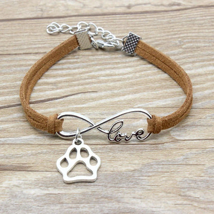 Stylish hand-woven infinite love pet bracelet in various colours, featuring a bow design and made of premium alloy materials