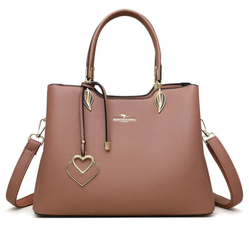 Black women's multi-layer PU leather shoulder messenger bag with sewing thread detail.