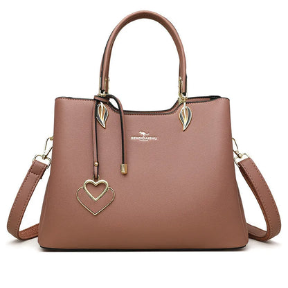 Black women's multi-layer PU leather shoulder messenger bag with sewing thread detail.