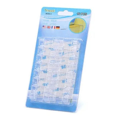 Self-adhesive plastic cable organiser clips in various colours holding a bundle of wires against a wall.