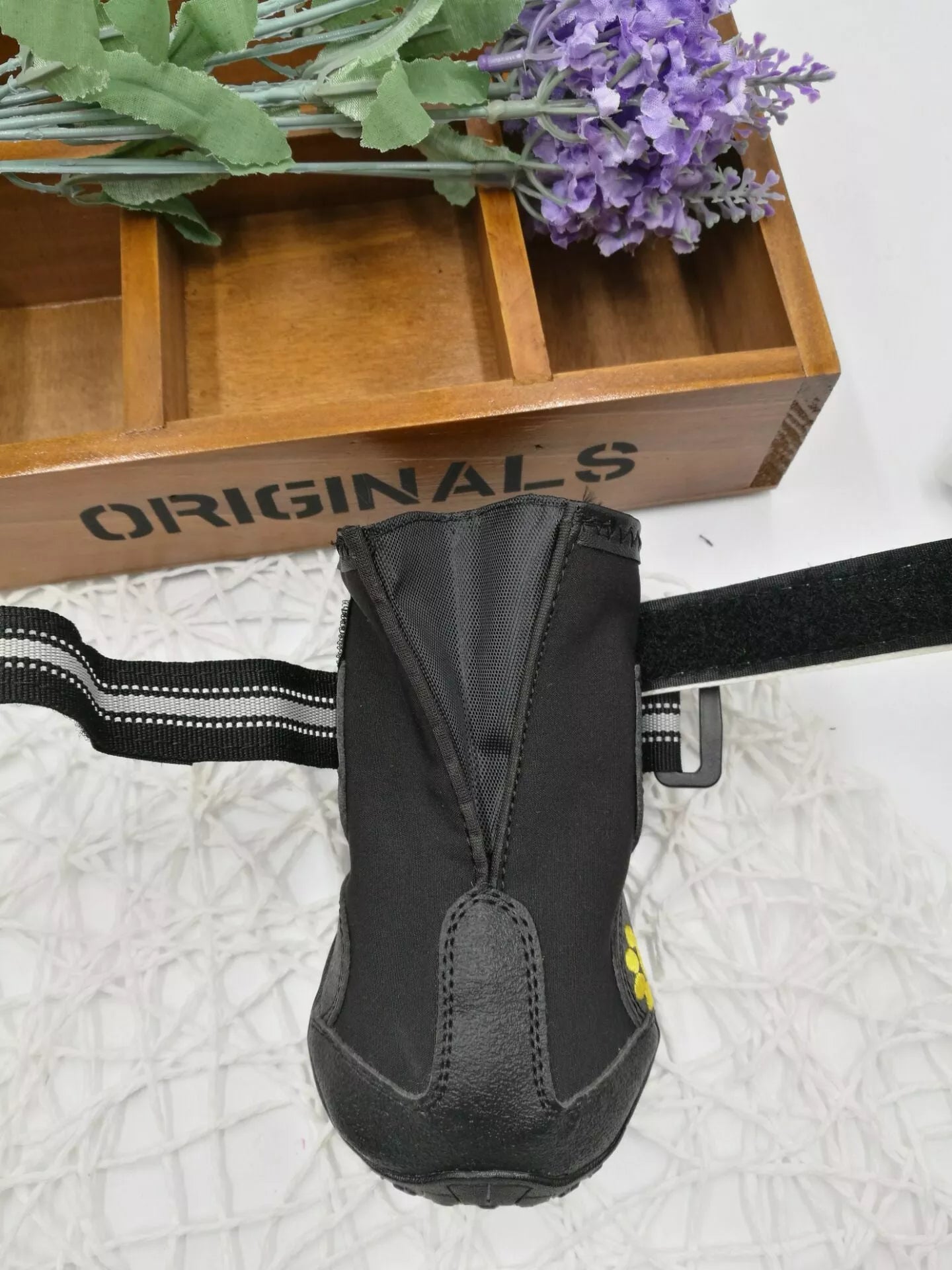 Black waterproof dog shoes with non-slip soles and adjustable fuzzy belt
