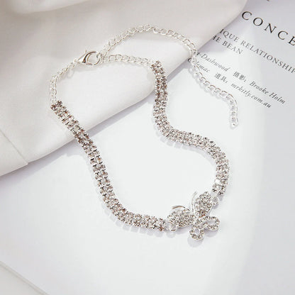 Butterfly anklet with bow design and sparkling gemstones for women