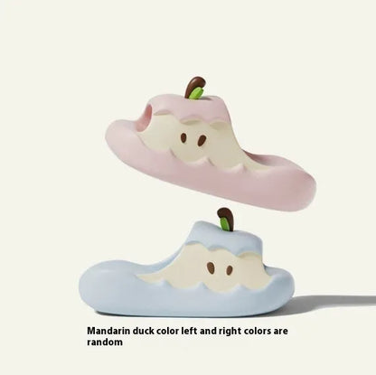 Cartoon fruit-themed EVA flip flop slippers for adults on a plain background.