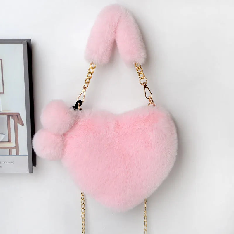 Plush heart-shaped women's handbag in medium size with removable shoulder strap