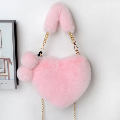 Plush heart-shaped women's handbag in medium size with removable shoulder strap