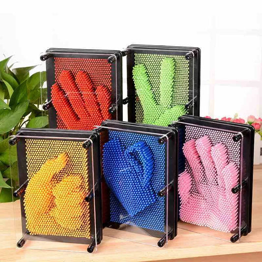 A customizable 3D sculpture impression frame with an array of pins that can capture the contours of any object pressed into it.