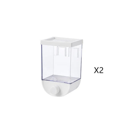 White wall-mountable kitchen food storage box with press lid dispenser, showing transparent body with cereal inside.