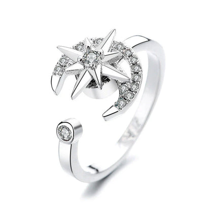 Adjustable spinner ring with rotating floral, geometric, and nature-inspired motifs for women's fashion and stress relief