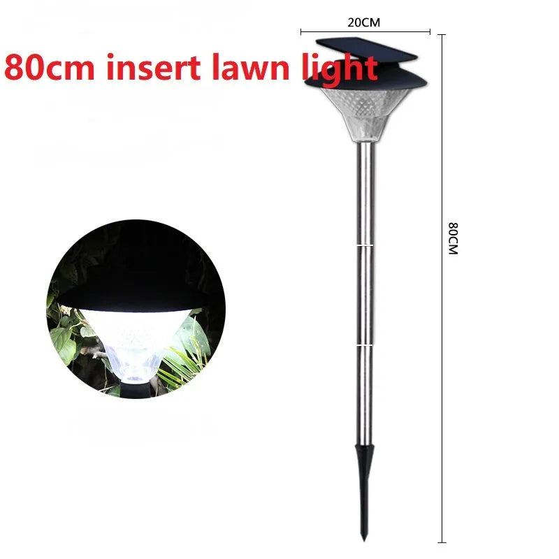 Solar-powered outdoor street light with solar panel on top and LED light fixture.