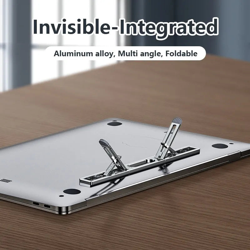 Silver aluminium laptop stand with an adjustable base on a wooden desk.