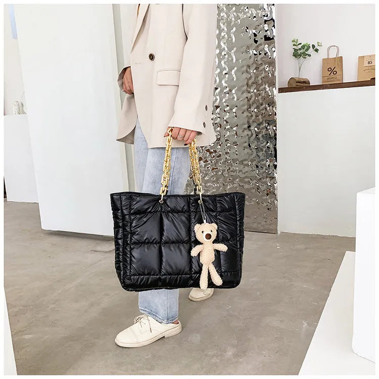Women's large chain tote shoulder bag in black with 45cm strap, zip fastening and internal pockets