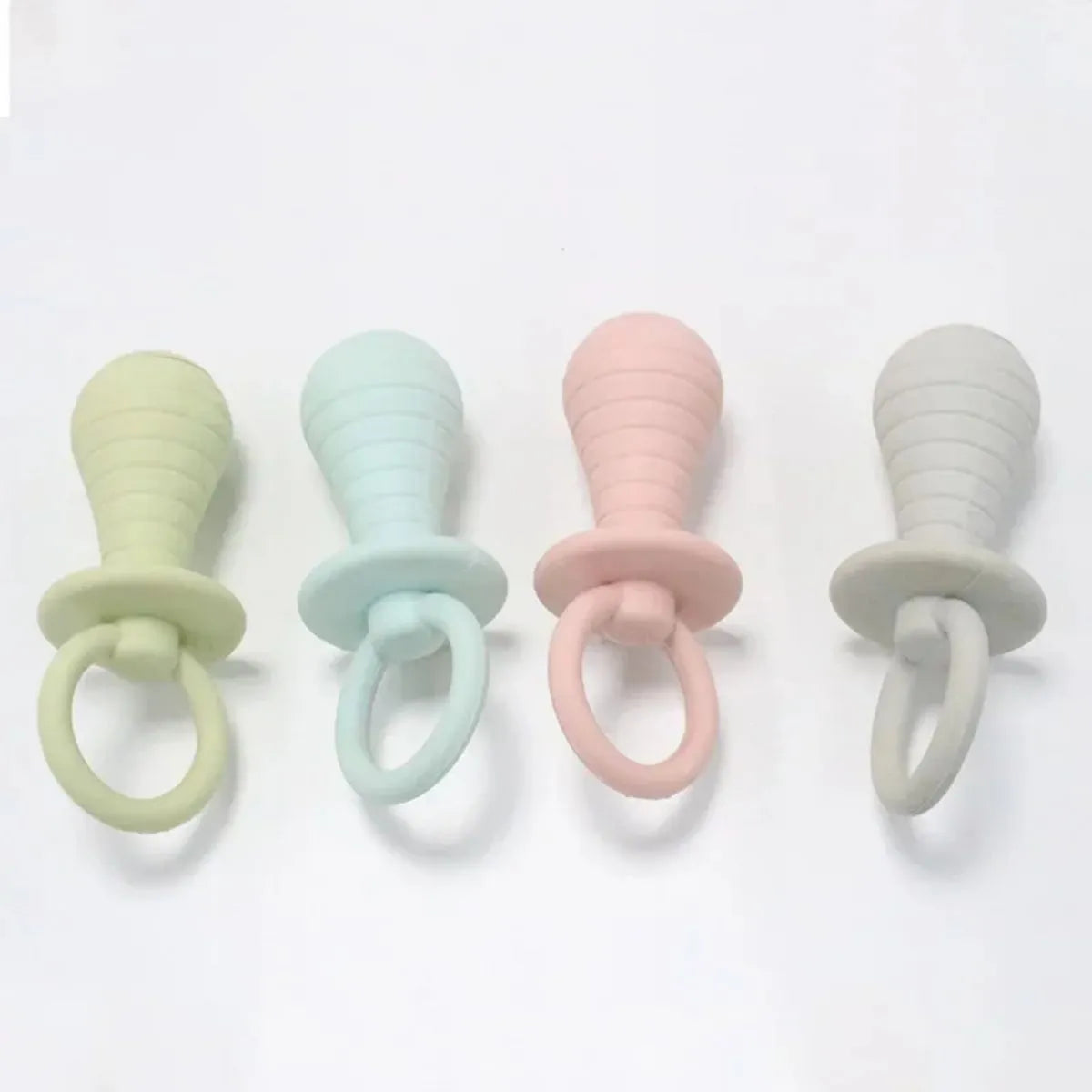Blue TPR pet pacifier chew toy with squeaker for puppies and kittens on a white background.
