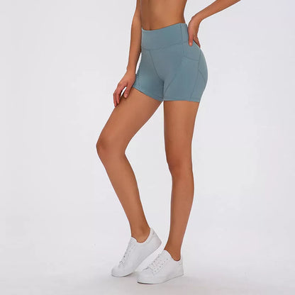 SHINBENE Women's High Waisted Sport Shorts in green, blue, and black