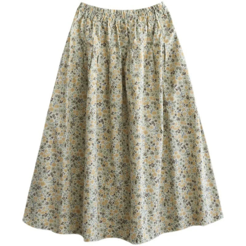 Elegant floral-printed cotton skirt with pleated design, available in yellow and blue flower patterns