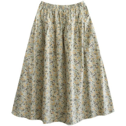 Elegant floral-printed cotton skirt with pleated design, available in yellow and blue flower patterns