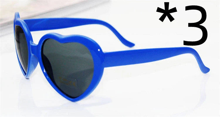Fashionable heart-shaped light-up glasses with a built-in LED lighting system, perfect for adding a touch of love and playfulness to any occasion.