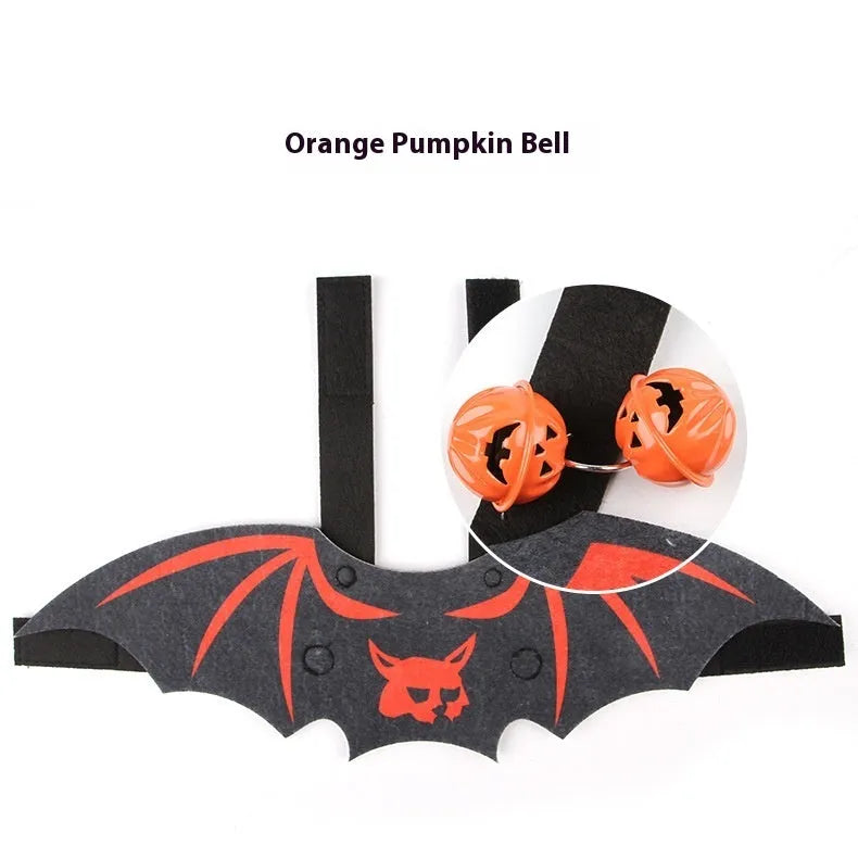 Halloween costume for a cat featuring batwing sleeves, made from felt, in orange pumpkin bat design.