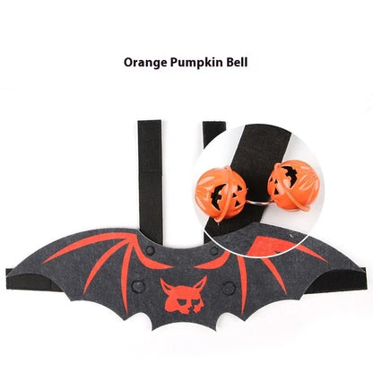 Halloween costume for a cat featuring batwing sleeves, made from felt, in orange pumpkin bat design.