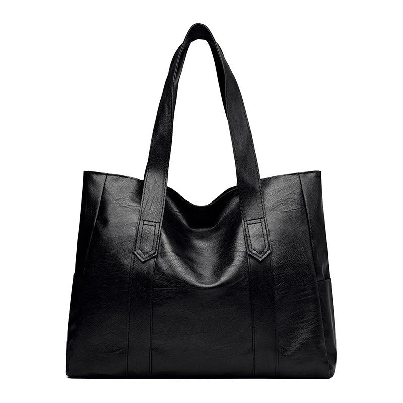 Stylish large capacity commuter shoulder bag in brown and black, perfect for autumn and winter fashion.