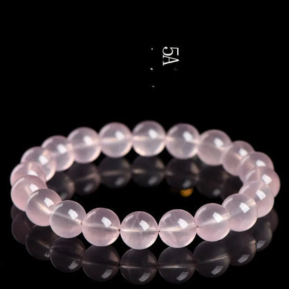 Natural starlight crystal bracelet with polished pink beads in multiple size options