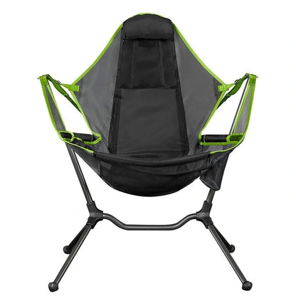 Green folding rocking chair unfolded on beach, 85cm tall with 60cm seat supporting 120kg